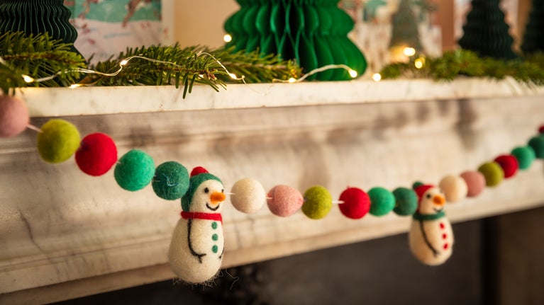 A chain of felt snowmen Christmas decorations